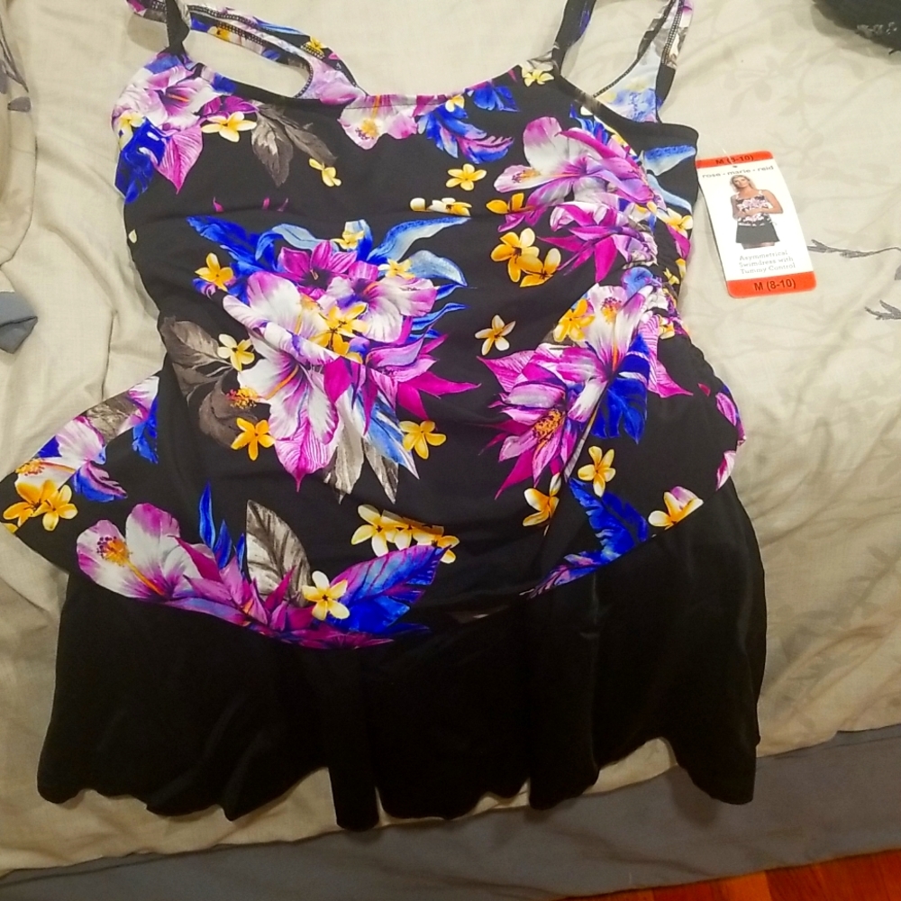 Ladies swim dress with tummy control.